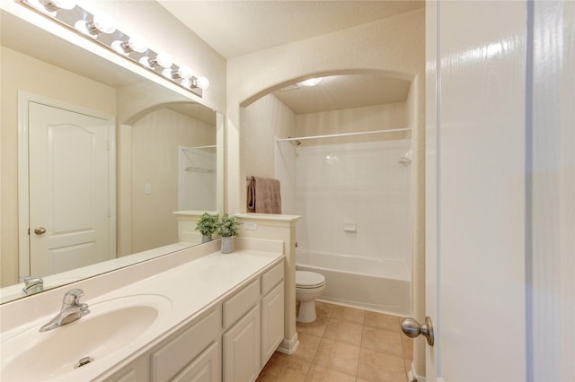 full bathroom featuring shower / bath combination, vanity, toilet, and tile patterned floors