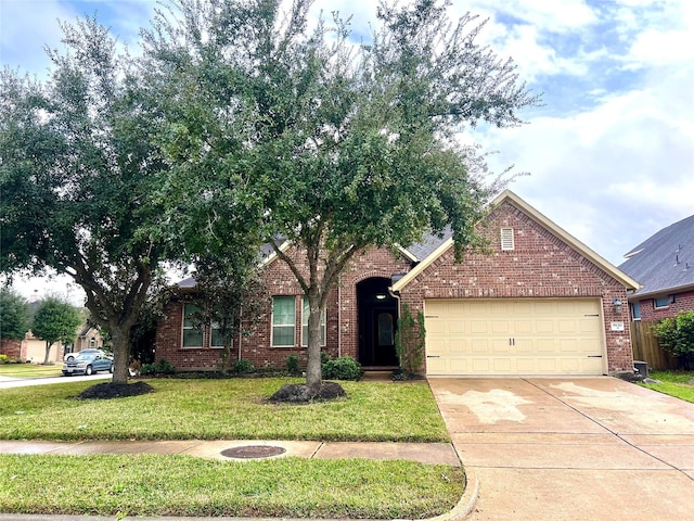 ranch-style house featuring a garage, concrete driveway, brick siding, and a front yard