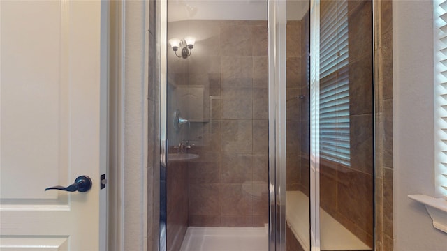 bathroom featuring a stall shower