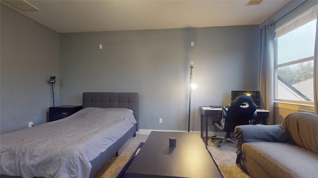 bedroom featuring baseboards