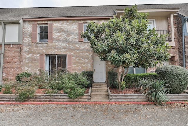 view of front of property with brick siding