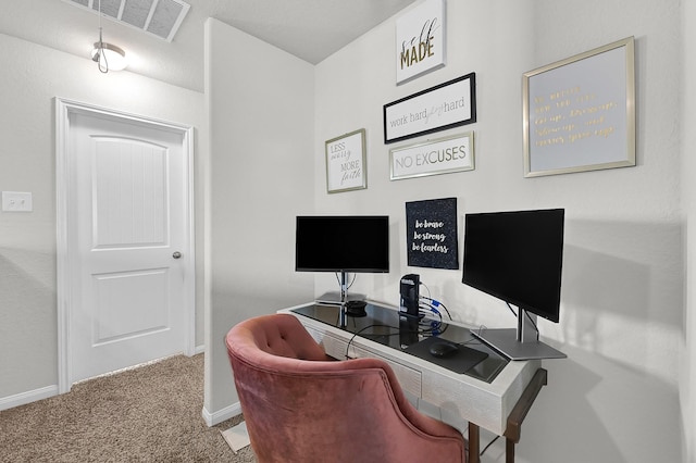 office space with carpet, visible vents, and baseboards