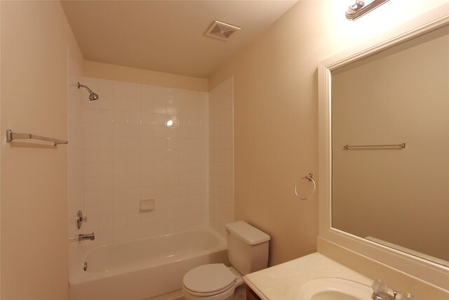 full bath with shower / bath combination, visible vents, vanity, and toilet