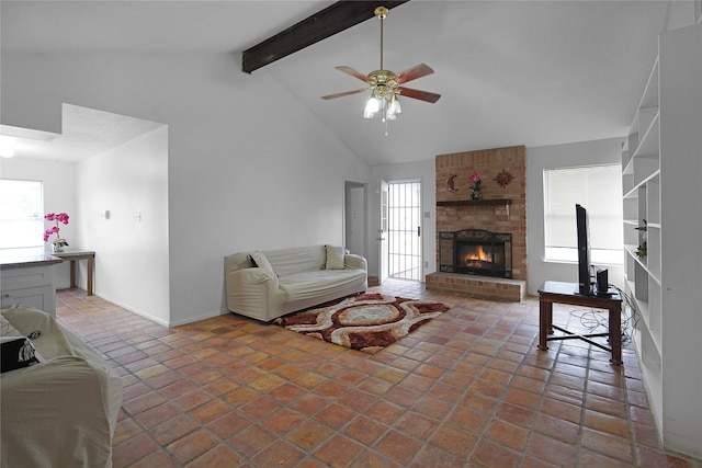 living area featuring light tile patterned floors, ceiling fan, a fireplace, high vaulted ceiling, and beam ceiling