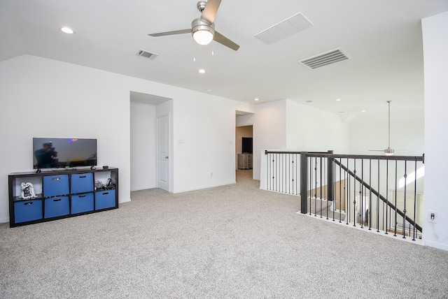 spare room with a ceiling fan, carpet, visible vents, and recessed lighting