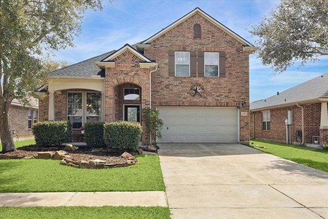 traditional-style house with a garage, brick siding, driveway, and a front lawn