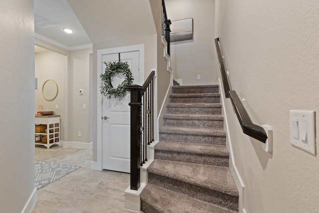 stairway featuring ornamental molding, recessed lighting, visible vents, and baseboards