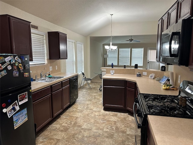 kitchen with black appliances, dark brown cabinets, light countertops, and lofted ceiling