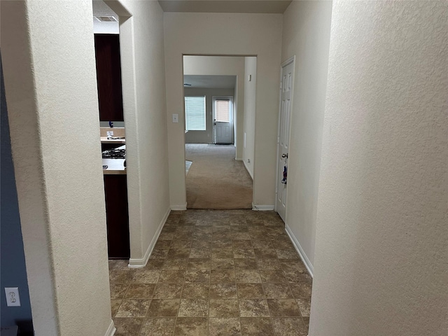 hallway with baseboards