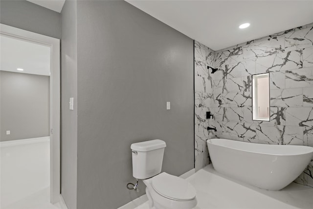 full bathroom featuring recessed lighting, toilet, a freestanding bath, and a shower