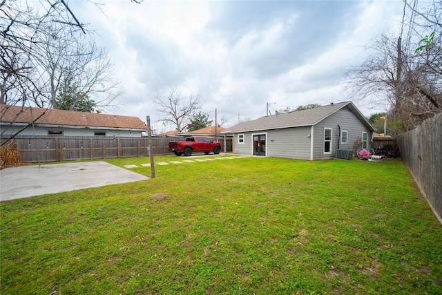 view of yard with cooling unit, a patio area, and a fenced backyard