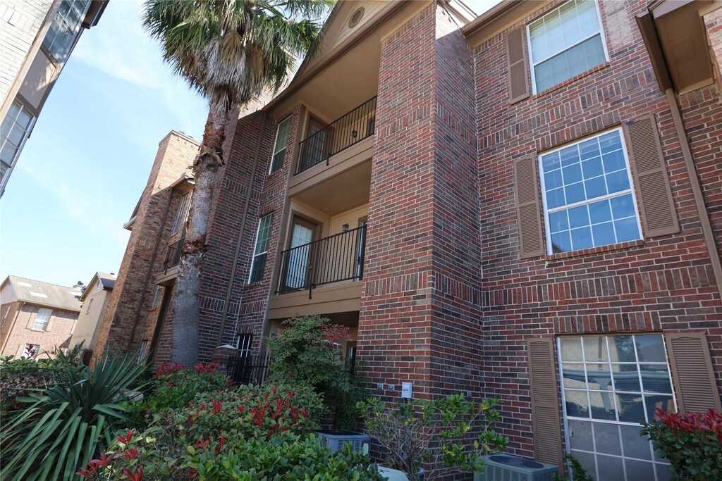 2121 Hepburn St Unit 817, Houston, TX 77054 - view of property featuring central AC unit