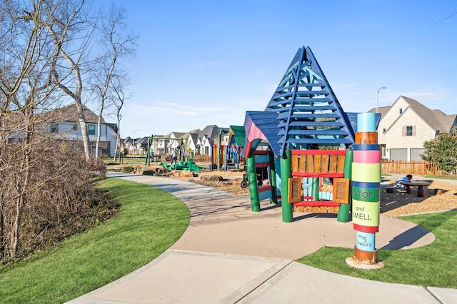 community jungle gym featuring a residential view