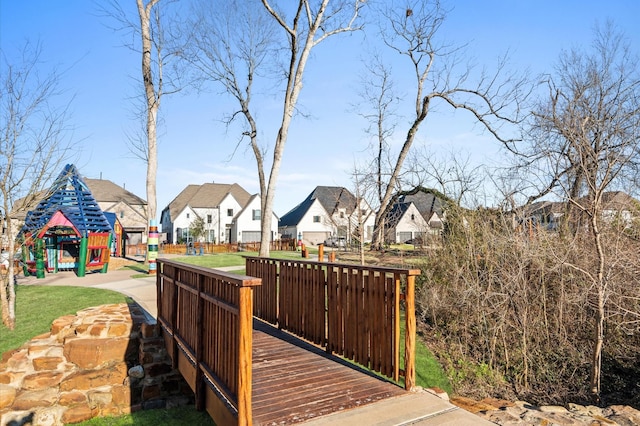 exterior space with a residential view and playground community