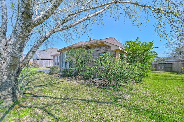 view of yard with fence