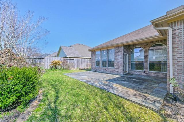 view of yard with a patio area and fence