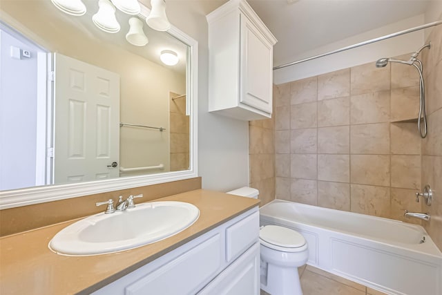 bathroom with toilet, tile patterned flooring, tub / shower combination, and vanity