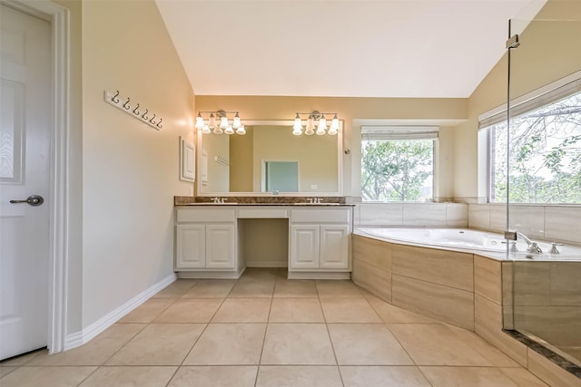 full bath with a garden tub, vaulted ceiling, and tile patterned floors