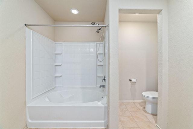 bathroom with tile patterned flooring, shower / tub combination, and toilet