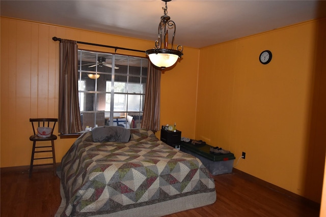 bedroom featuring wood finished floors