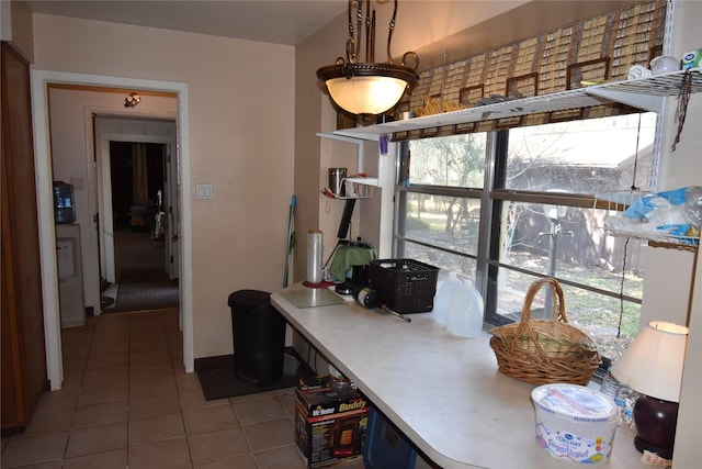 interior space with light tile patterned floors