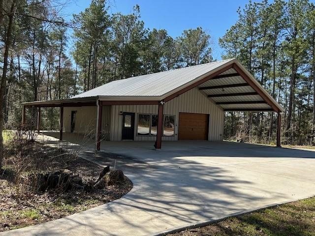 exterior space with a detached garage