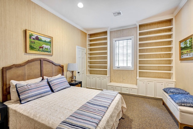 bedroom featuring ornamental molding, carpet, and visible vents