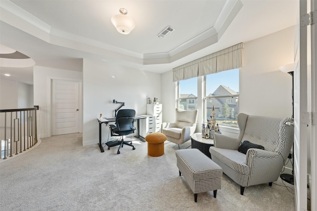 home office with baseboards, visible vents, a tray ceiling, crown molding, and carpet flooring