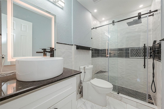 full bath with marble finish floor, recessed lighting, toilet, a shower stall, and vanity