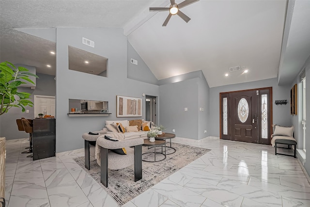 living area featuring marble finish floor, visible vents, and ceiling fan