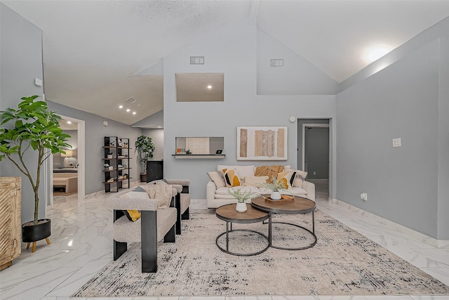 living area with marble finish floor, baseboards, visible vents, and vaulted ceiling