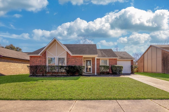 view of front of house featuring an attached garage, a front lawn, concrete driveway, and brick siding