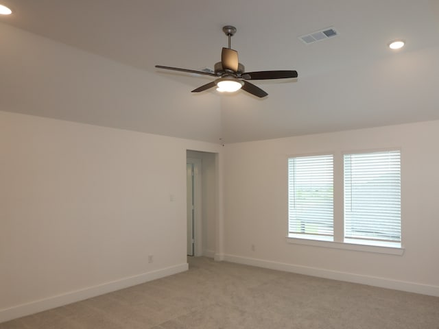 21706 Persian Lake Dr, Cypress, TX 77433 - spare room featuring a ceiling fan, recessed lighting, light carpet, and vaulted ceiling