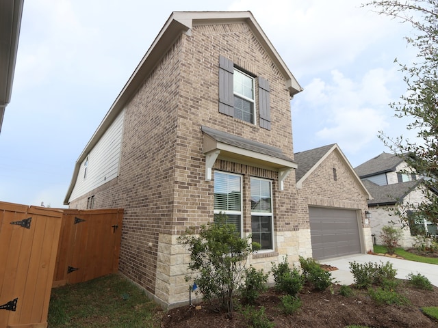 21706 Persian Lake Dr, Cypress, TX 77433 - traditional home with brick siding, driveway, a garage, and a gate