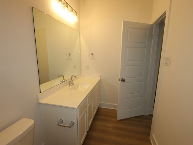 21706 Persian Lake Dr, Cypress, TX 77433 - half bath featuring wood finished floors and vanity