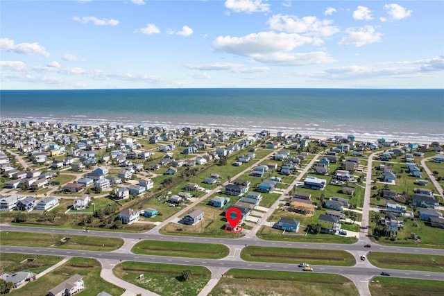 bird's eye view featuring a water view and a residential view