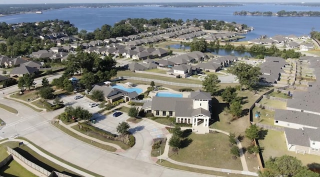 aerial view with a residential view and a water view