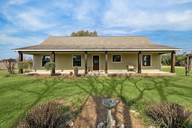 view of front of property with a front lawn