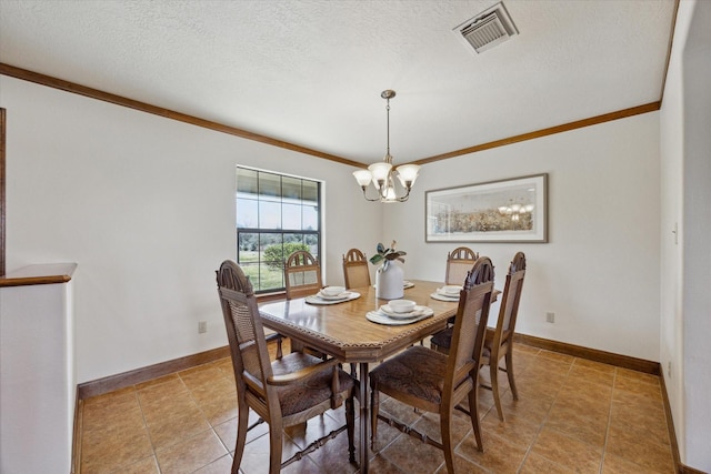 dining area featuring a chandelier, a textured ceiling, visible vents, baseboards, and ornamental molding