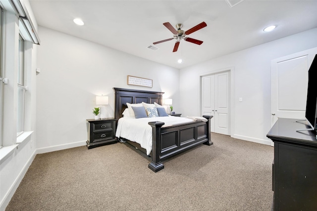 bedroom with recessed lighting, visible vents, baseboards, and carpet