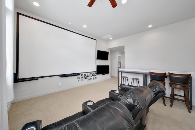 home theater room featuring recessed lighting, baseboards, light colored carpet, and a ceiling fan