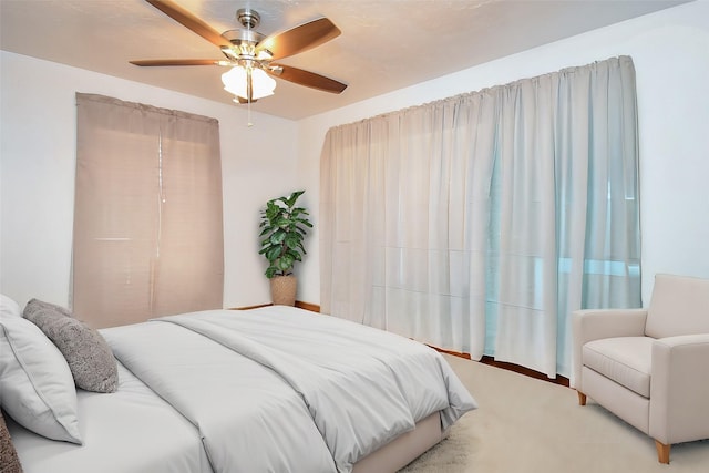 bedroom featuring ceiling fan