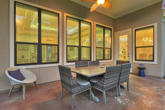 view of patio / terrace with a ceiling fan and outdoor dining area