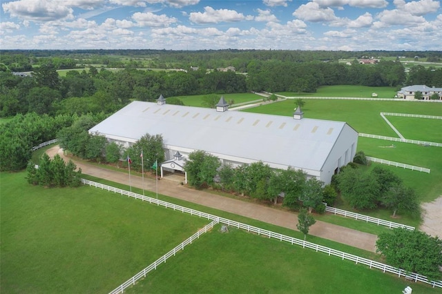 drone / aerial view featuring a forest view and a rural view