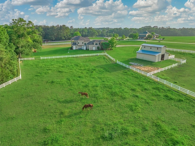 birds eye view of property featuring a rural view