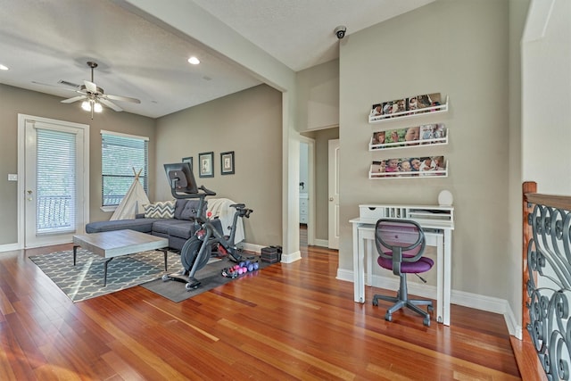 exercise room with visible vents, baseboards, ceiling fan, wood finished floors, and recessed lighting