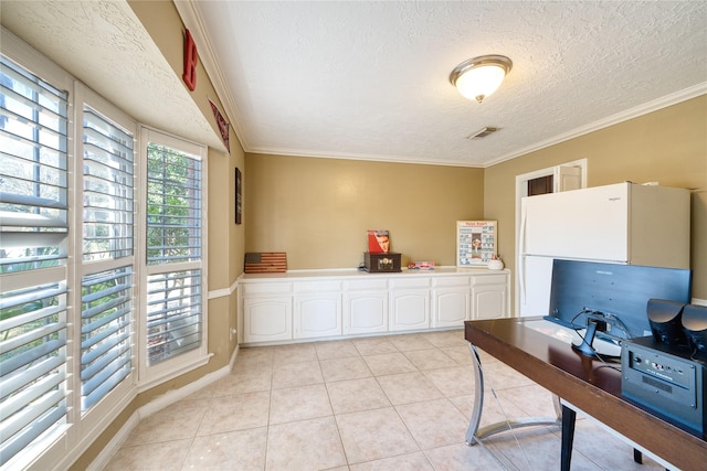 home office with light tile patterned floors, a textured ceiling, visible vents, and crown molding