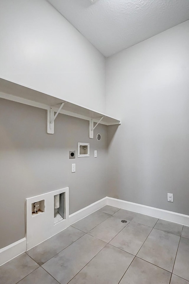 washroom with washer hookup, laundry area, electric dryer hookup, and baseboards