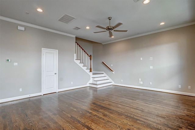 spare room with crown molding, recessed lighting, visible vents, wood finished floors, and stairs