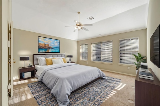 bedroom featuring crown molding, light colored carpet, visible vents, vaulted ceiling, and baseboards